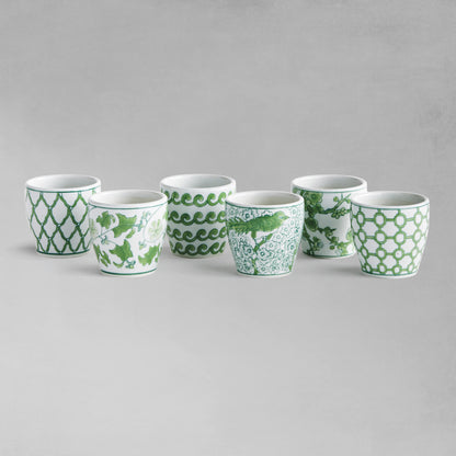 Set of 6 chinoiserie green and white porcelain flower pots with gray background.