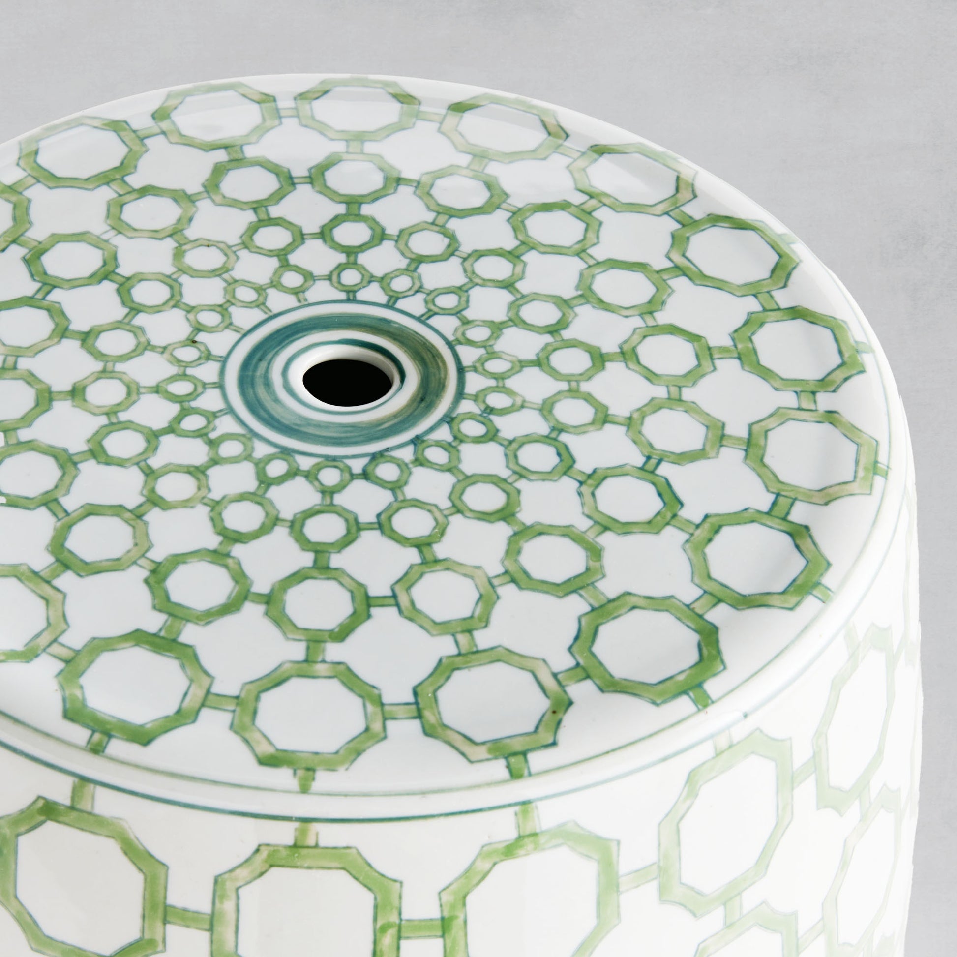 Chinoiserie green and white porcelain side table, top view closeup.