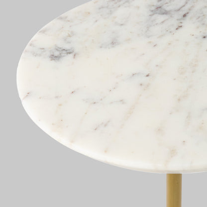 Contemporary antique brass and marble accent table, closeup view of top.