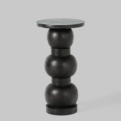 Contemporary stacked black marble accent table.