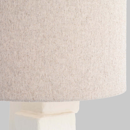 Contemporary white plaster table lamp, closeup view of lampshade.