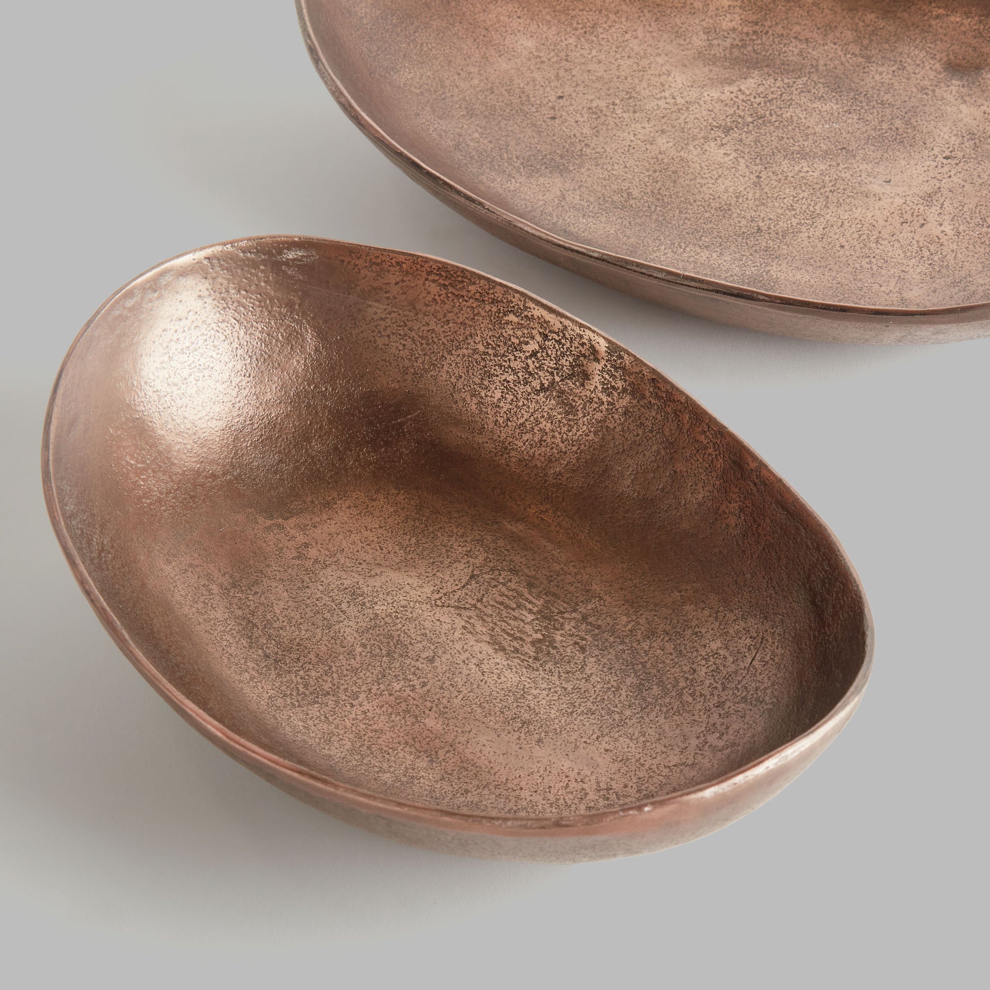 Copper textured oval decorative bowls (set of 2) - stylish home accent (Image1).