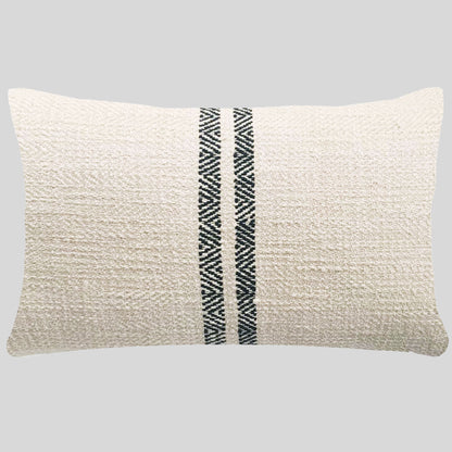 Cream double striped lumbar pillow with gray background.