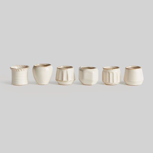 Cream stoneware mini cachepots (set of 6) - stylish home accent (Image1).