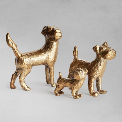 Decorative dog objects, set of 3, with gray background.