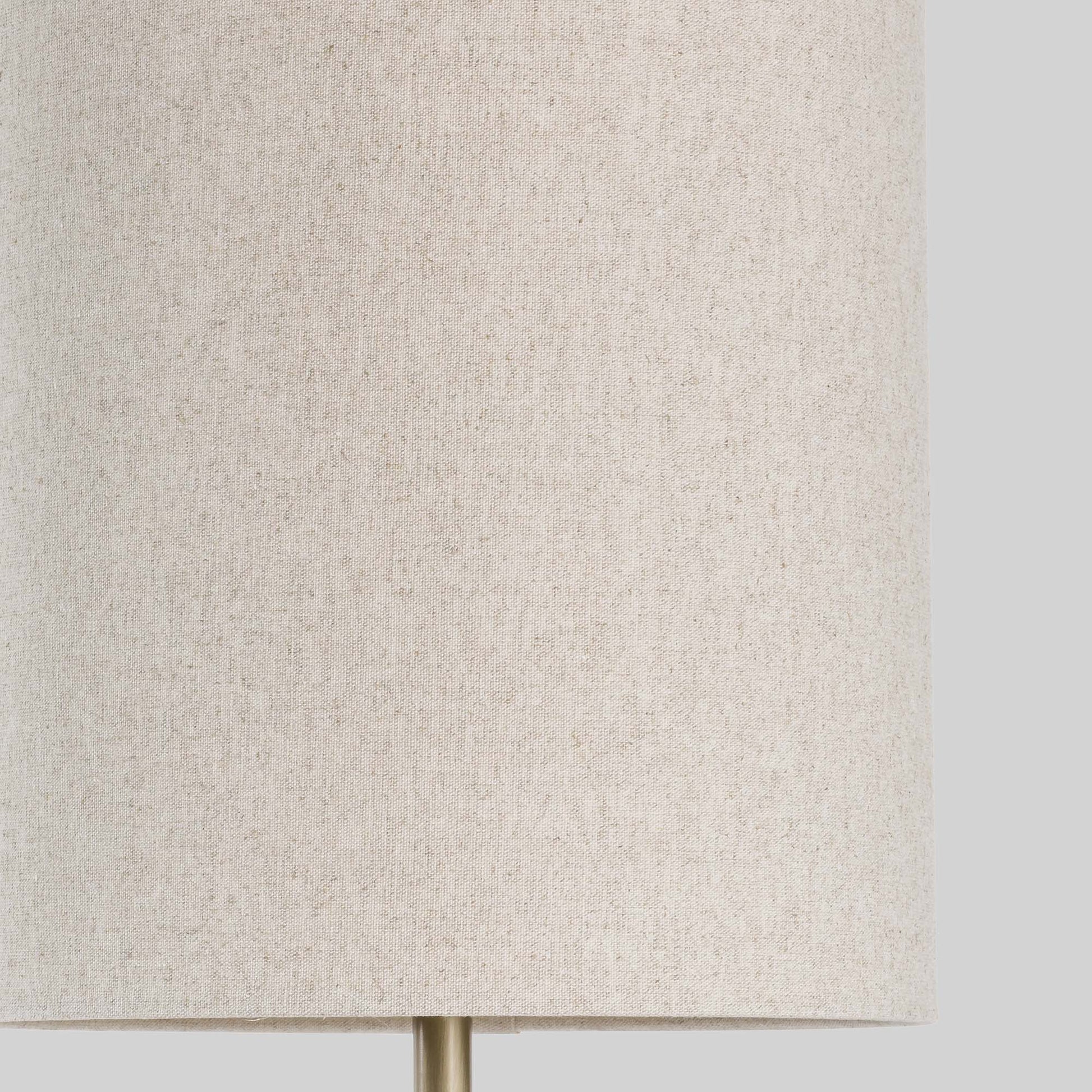 Floor lamp with a stacked circular wood base on a light gray background.