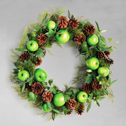 24" faux green apple and mixed botanicals wreath with gray background.