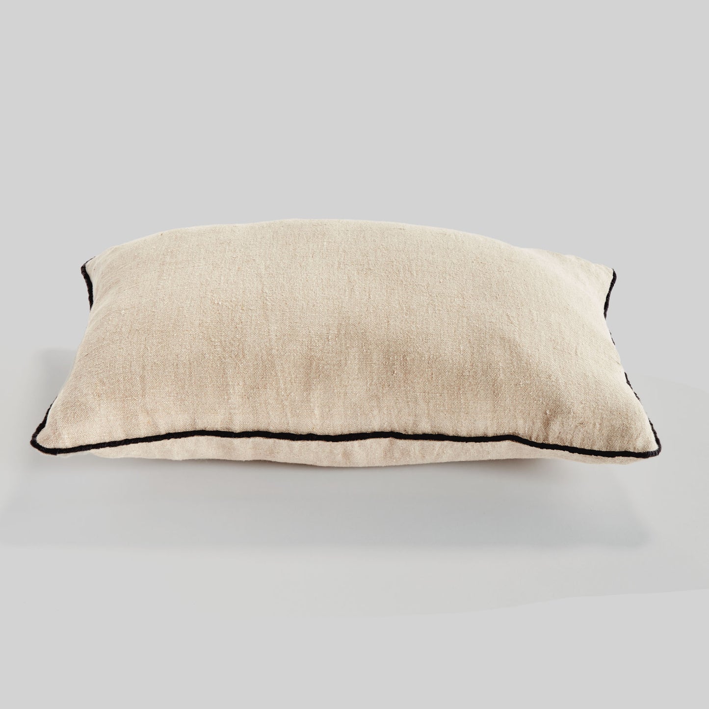 Oatmeal jacquard woven lumbar pillow for home decor and accessories.