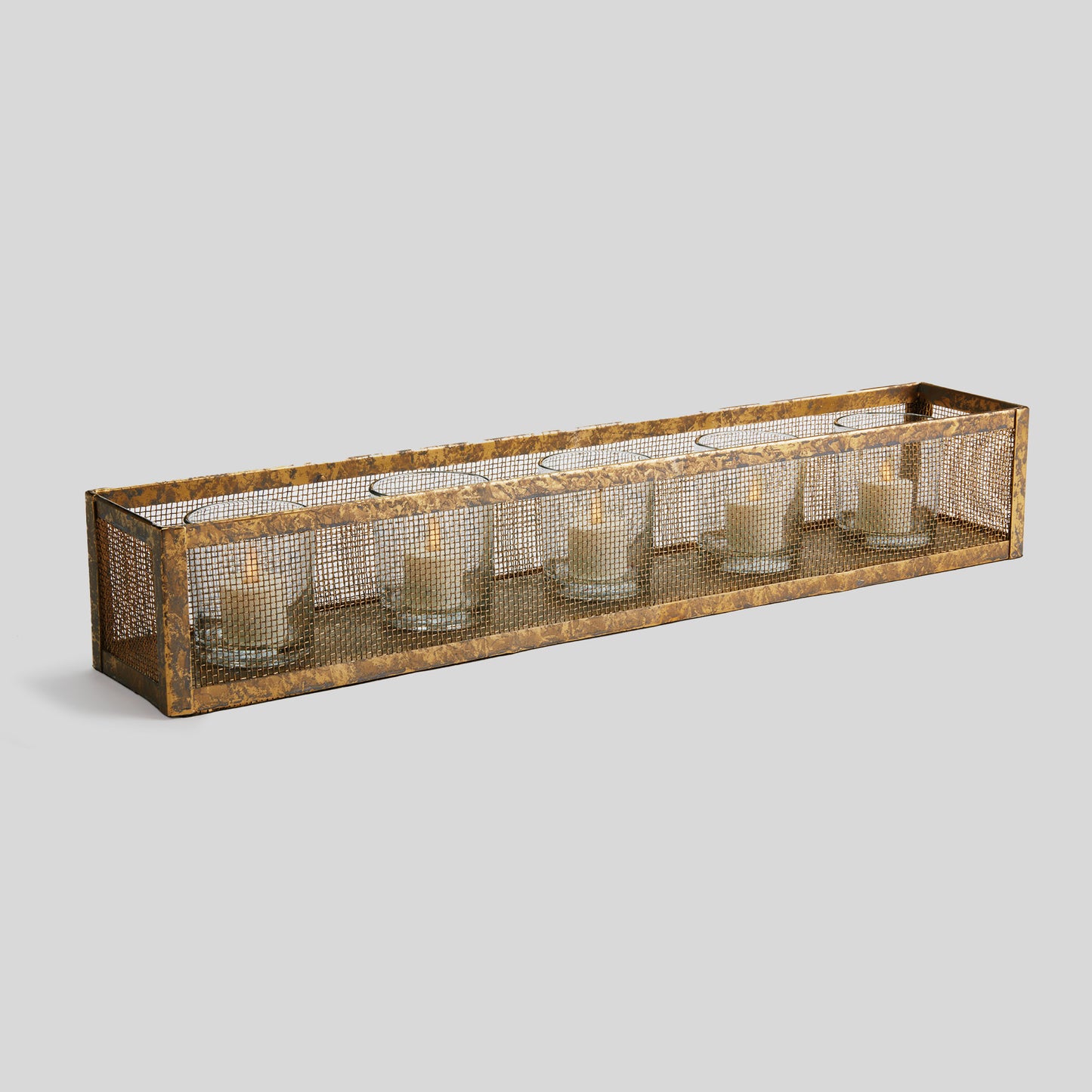 Gold mesh linear hurricane candleholder with light gray background.