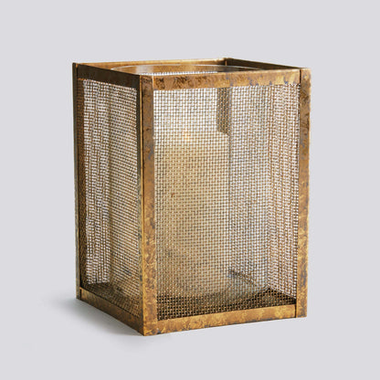 Gold mesh small hurricane candleholder with light gray background.