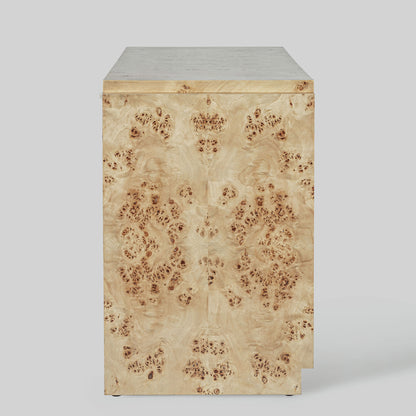 Light burl wood sideboard on gray background.