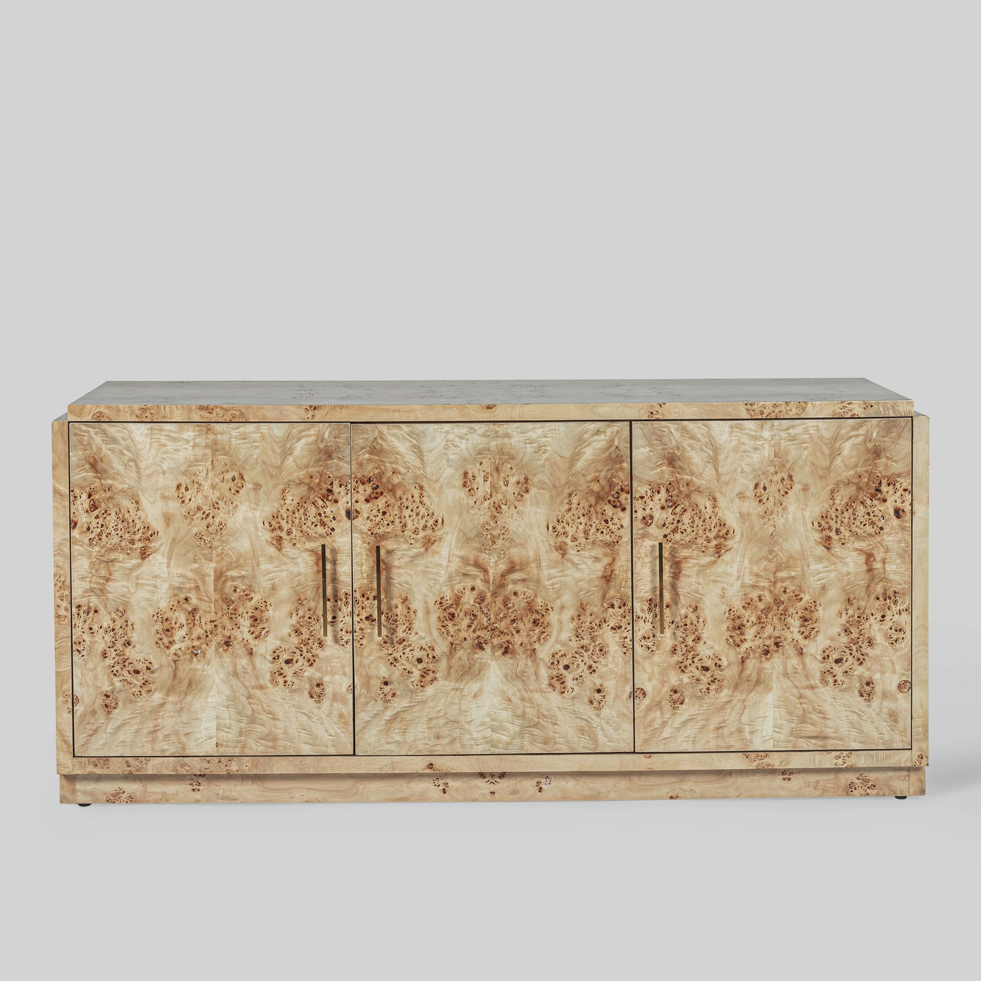 Light burl wood sideboard on gray background.