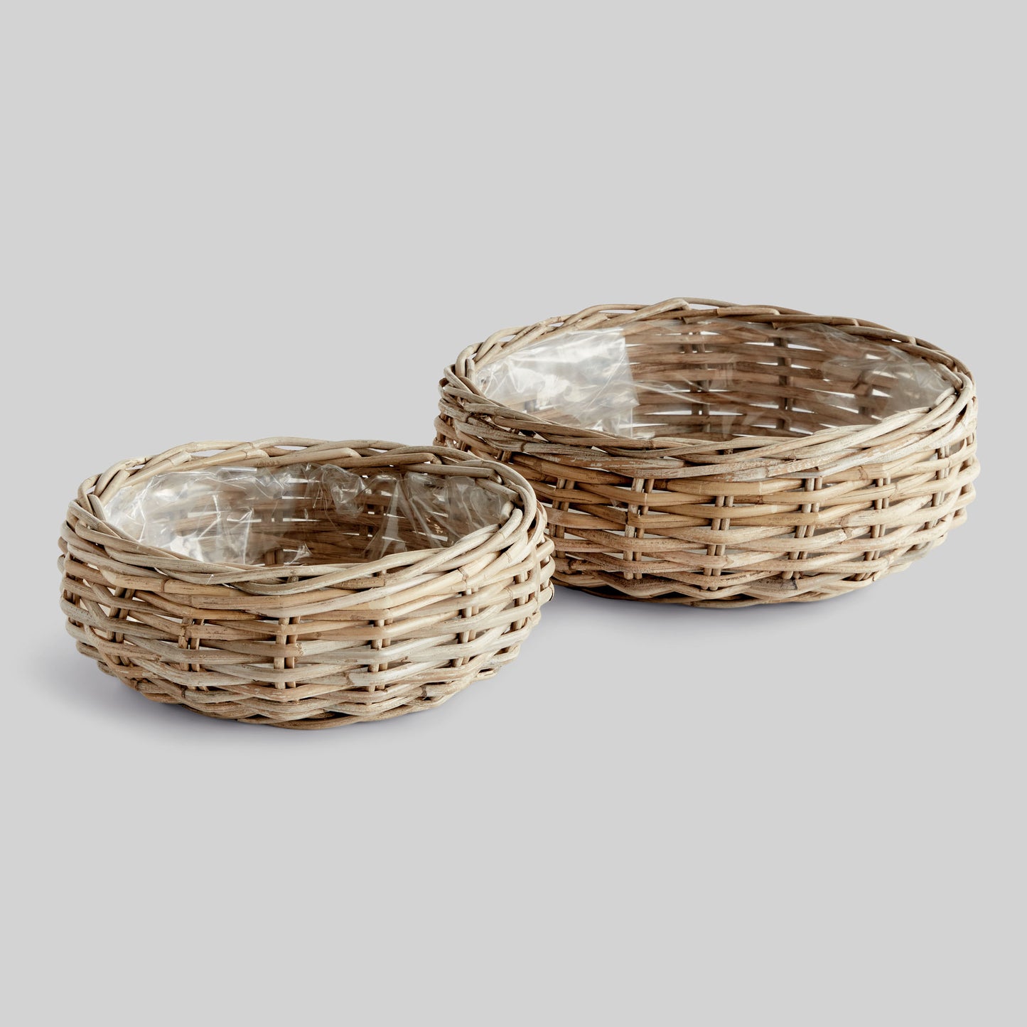 Gray rattan low basket planters (set of 2) - stylish home accent (Image1).