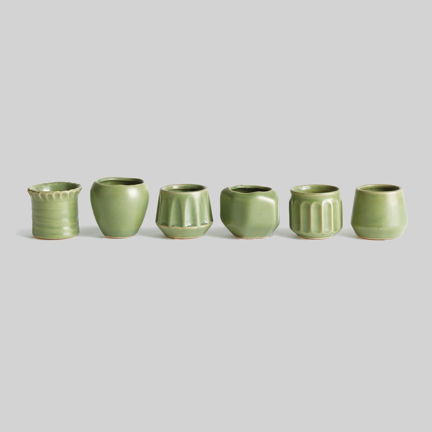 Green stoneware mini cachepots (set of 6) - stylish home accent (Image1).