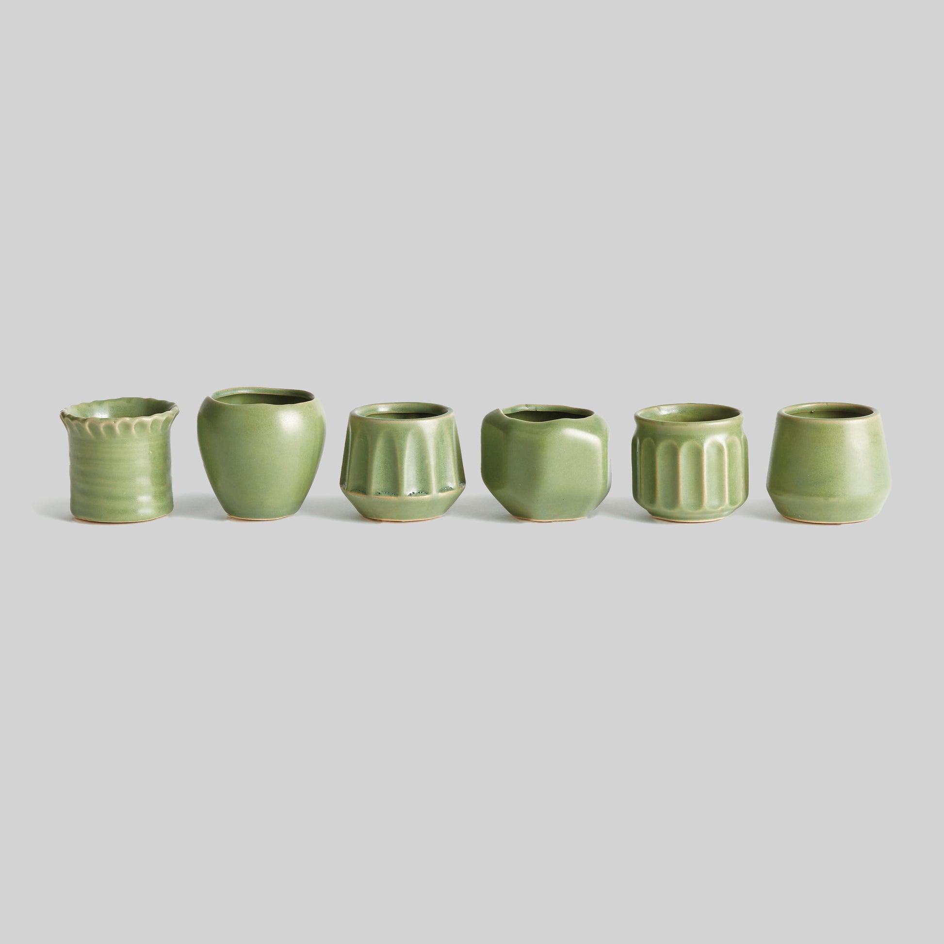 Green stoneware mini cachepots (set of 6) - stylish home accent (Image1).