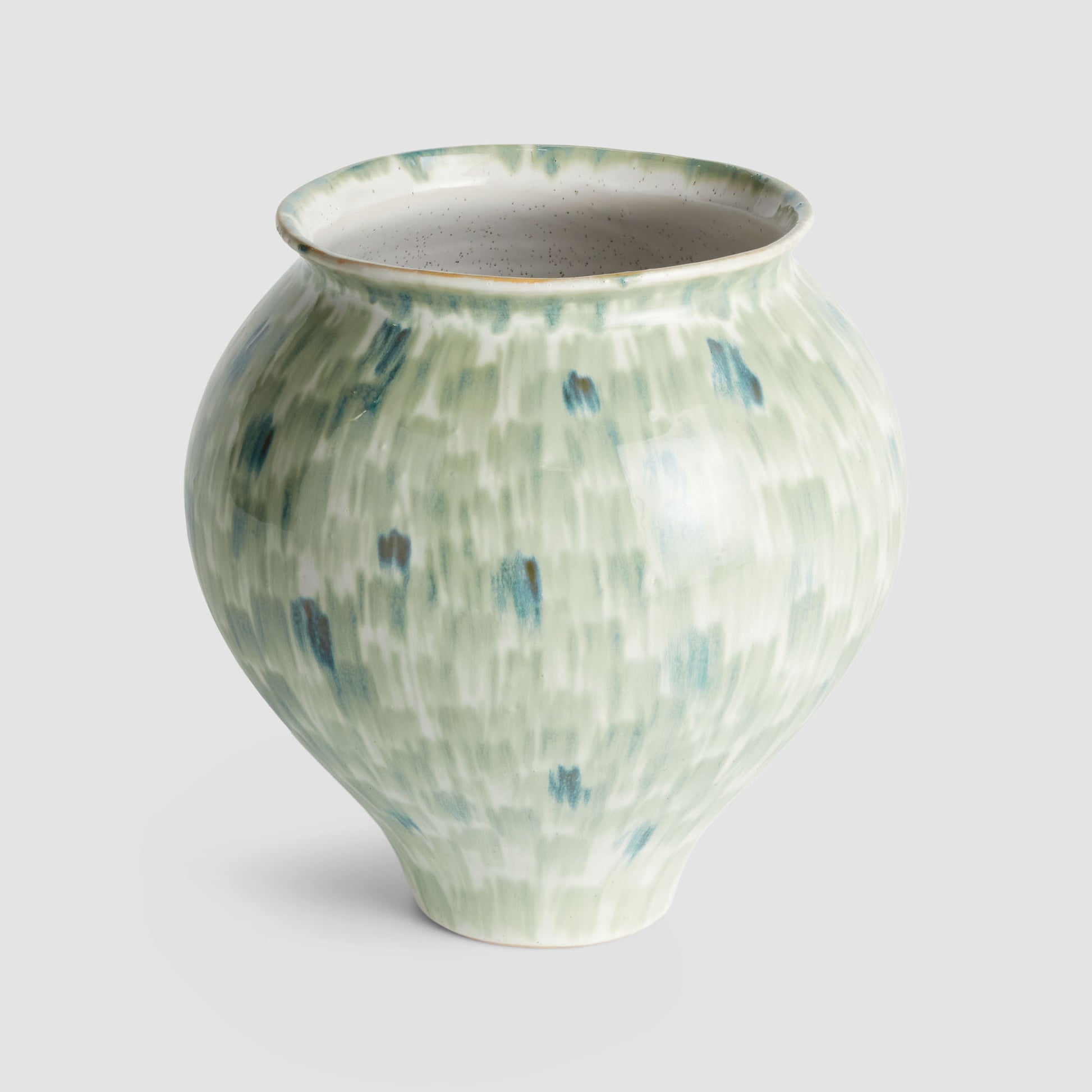 Green stoneware small vase - stylish home accent (Image1).