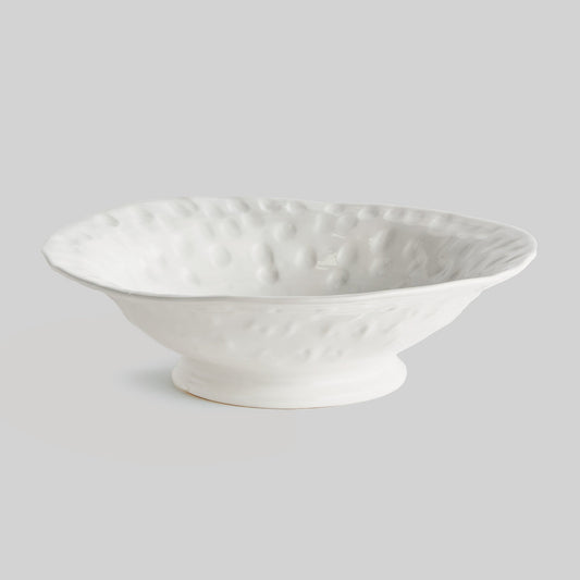 Handcrafted italian dimpled ceramic bowl - stylish home accent (Image1).