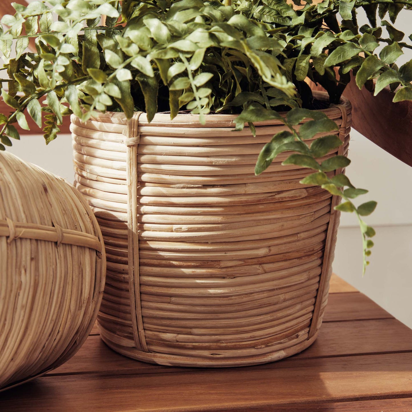 Handwoven cane rattan mini baskets, closeup view.