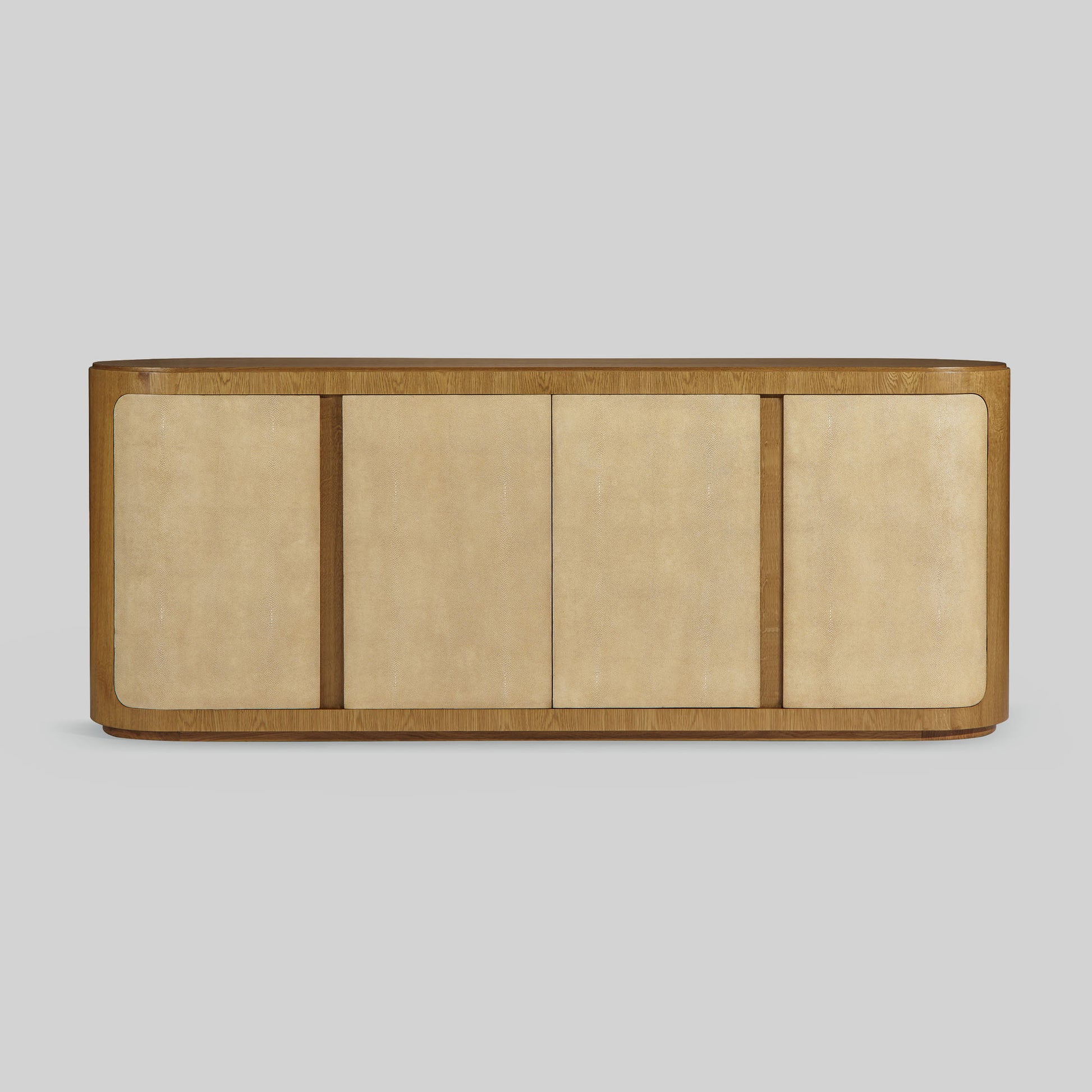 Natural oak sideboard with shagreen finished door panels on gray background.