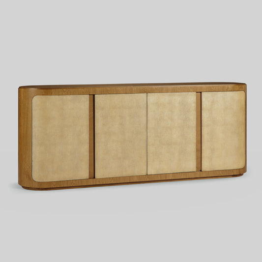 Natural oak sideboard with shagreen finished door panels on gray background.