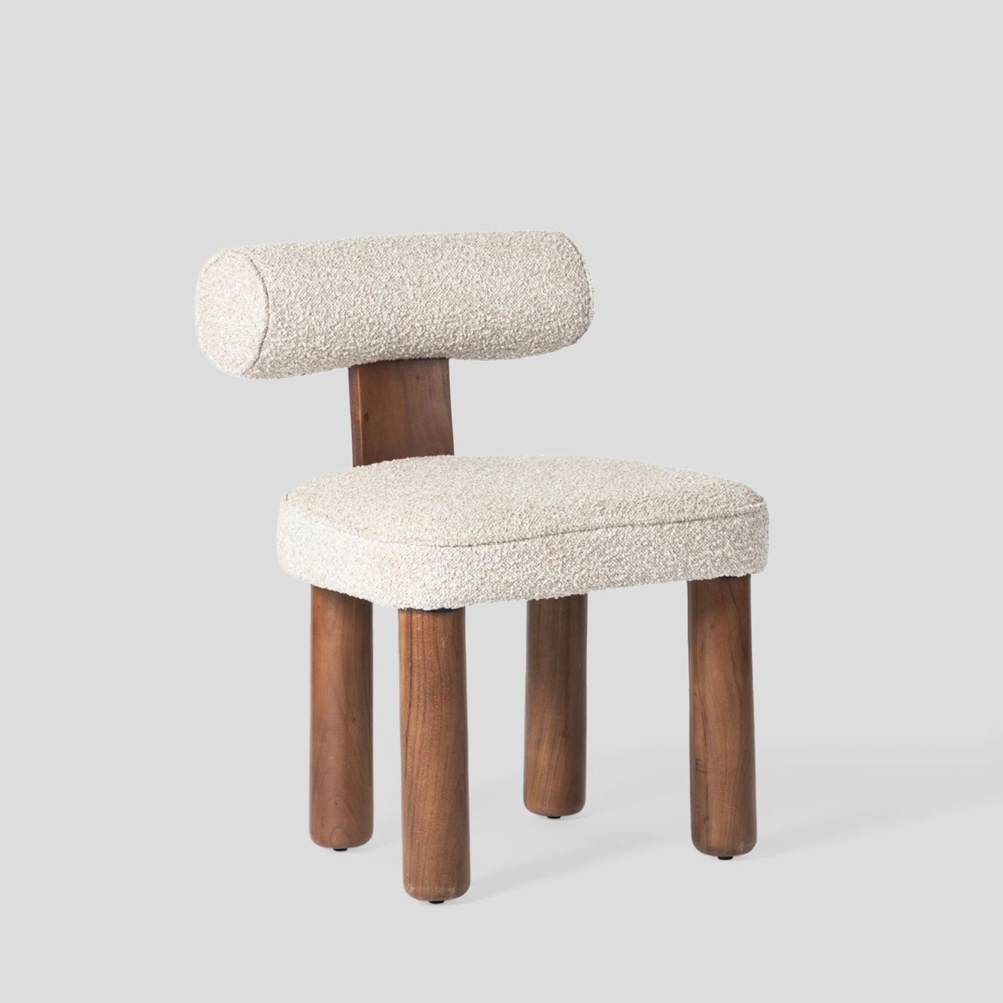 Chair with wooden legs and beige cushioned seat and backrest on a light gray background