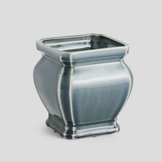 Large blue reactive glaze ceramic pot - stylish home accent (Image1).