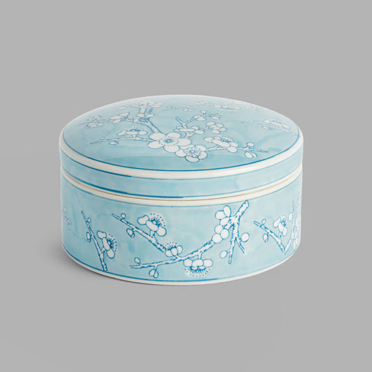 Large round light blue hand-painted porcelain lidded box - stylish home accent (Image1).