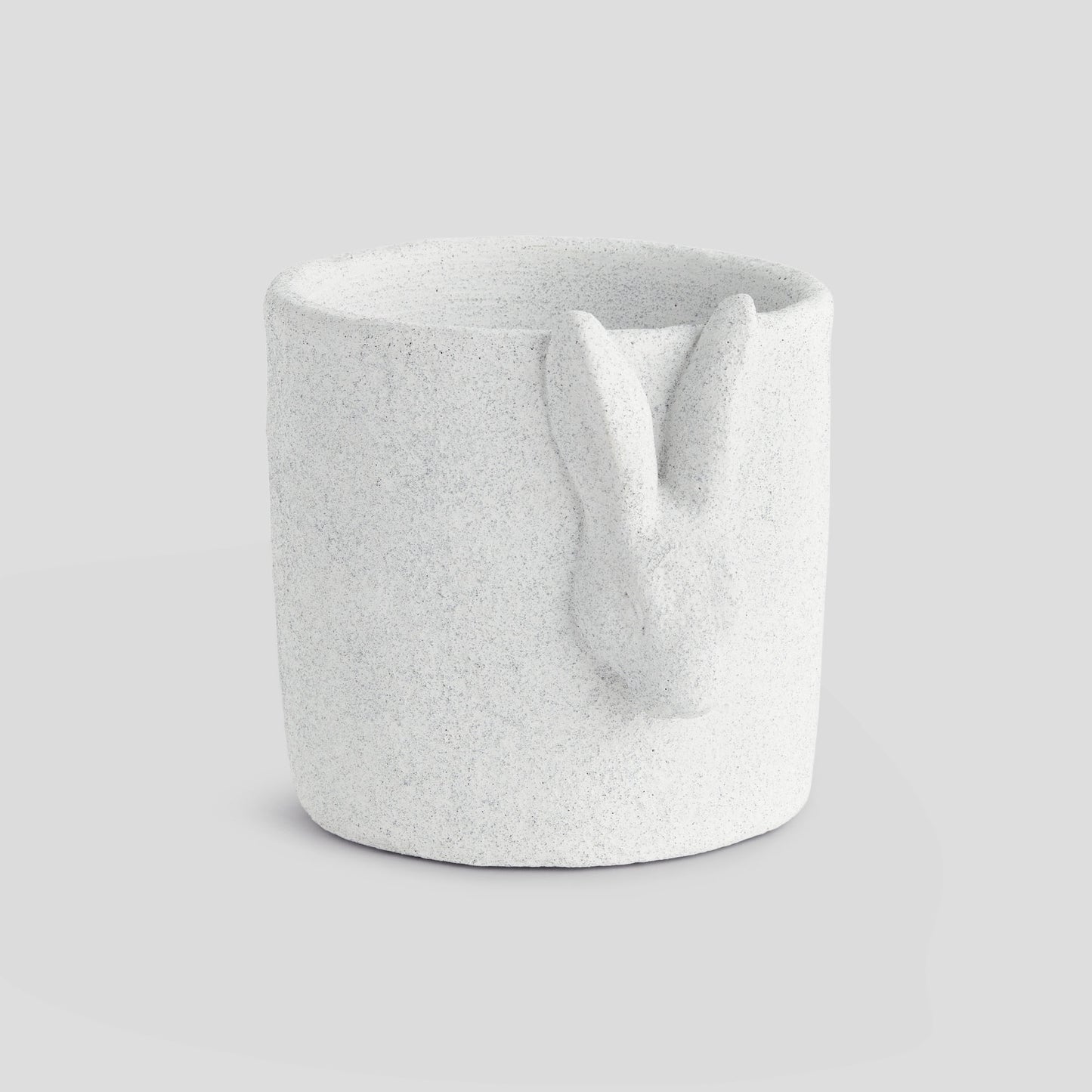 Large white concrete rabbit relief pot - stylish home accent (Image1).