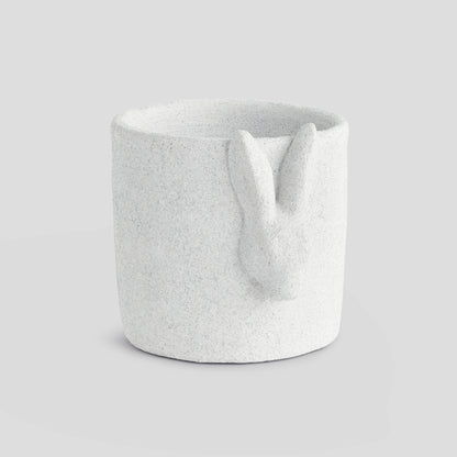 Large white concrete rabbit relief pot - stylish home accent (Image1).
