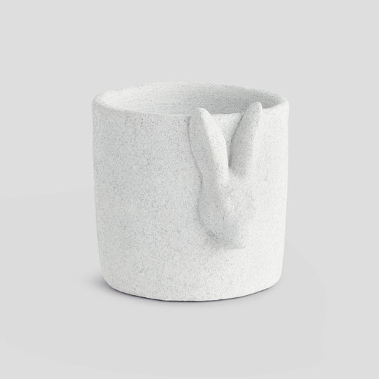 Large white concrete rabbit relief pot - stylish home accent (Image1).