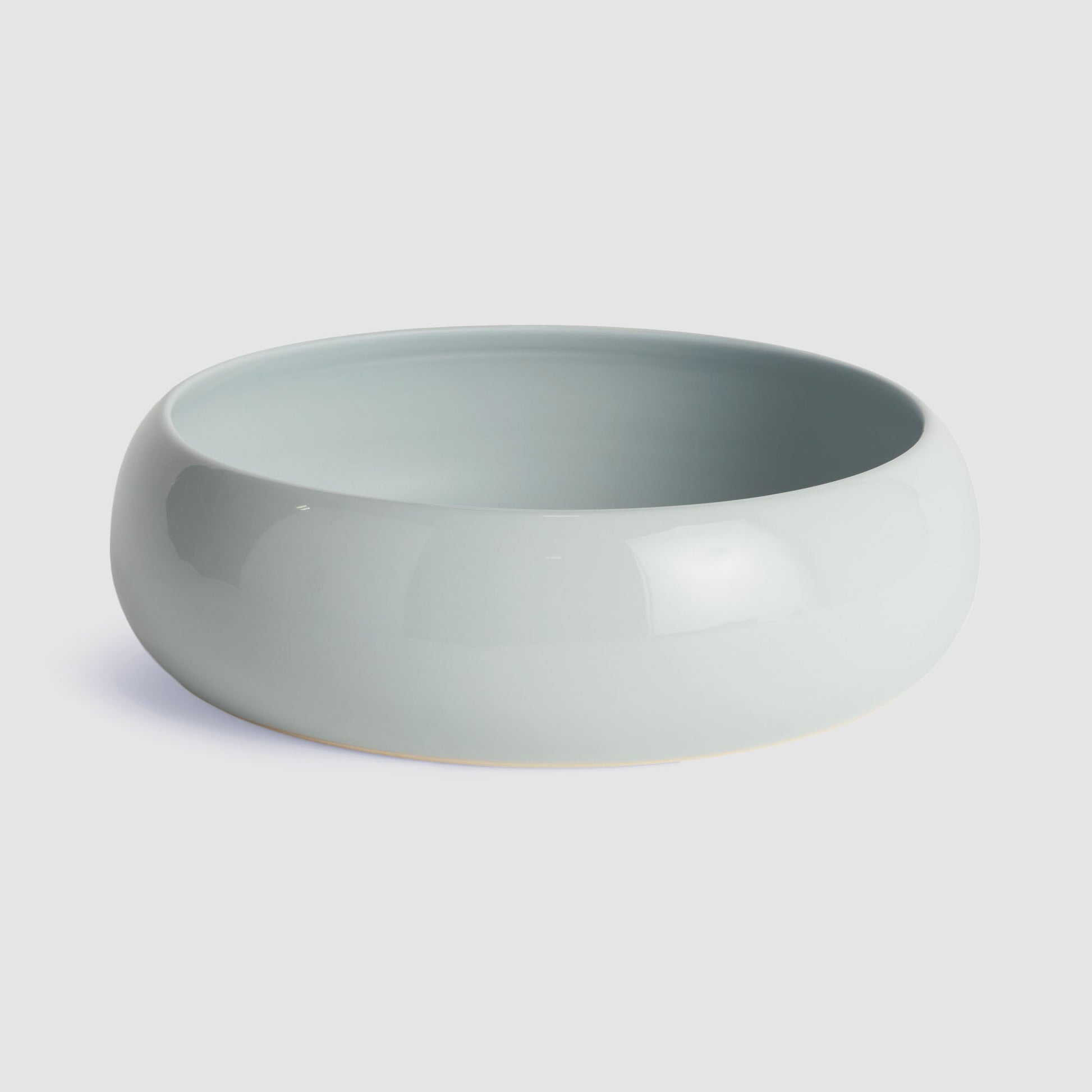 Light blue ceramic decorative bowl - stylish home accent (Image1).