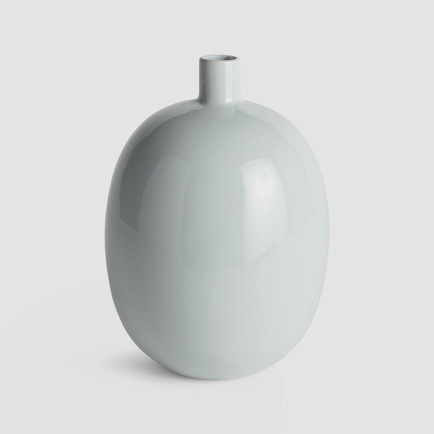Light blue glossy medium vase - stylish home accent (Image1).