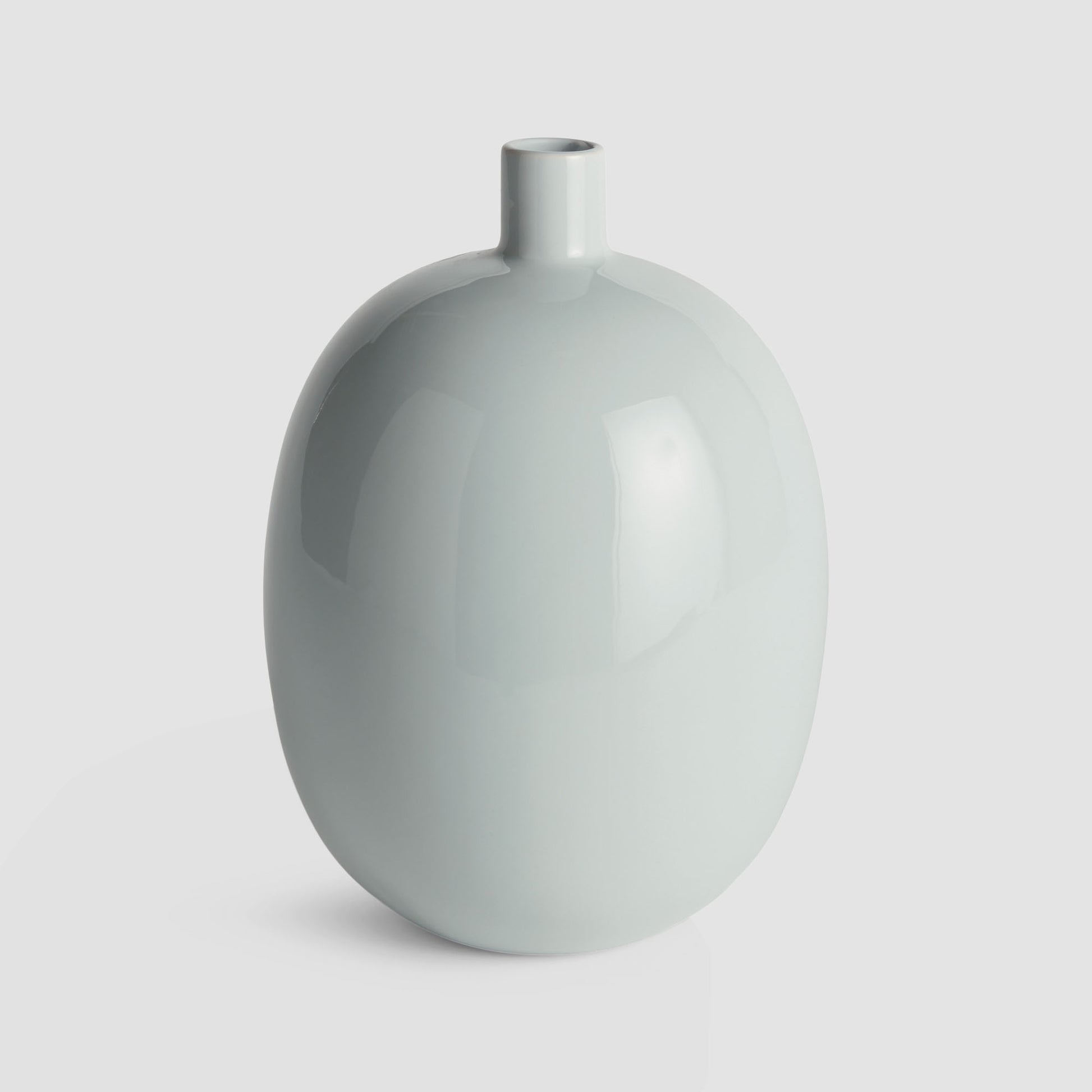 Light blue glossy medium vase - stylish home accent (Image1).