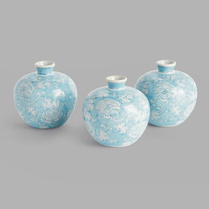 Light blue hand-painted porcelain bud vases (set of 3) - stylish home accent (Image1).