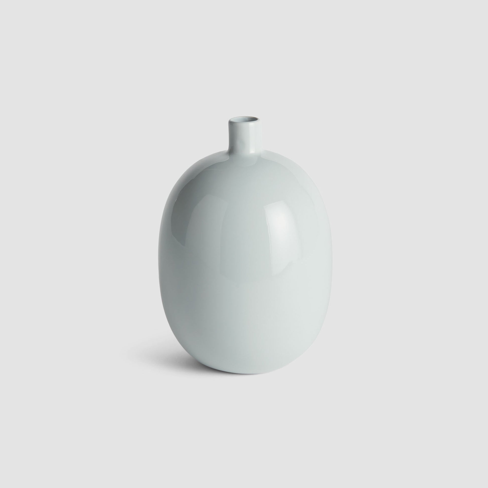 Light blue stoneware small vase - stylish home accent (Image1).