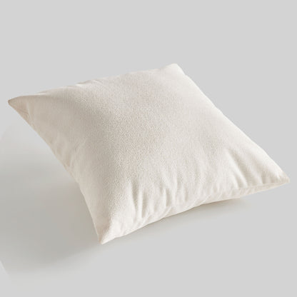 Light cream jacquard square pillow for home decor and accessories.