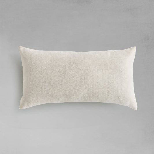 Light cream jacquard woven pillow for home decor and accessories.