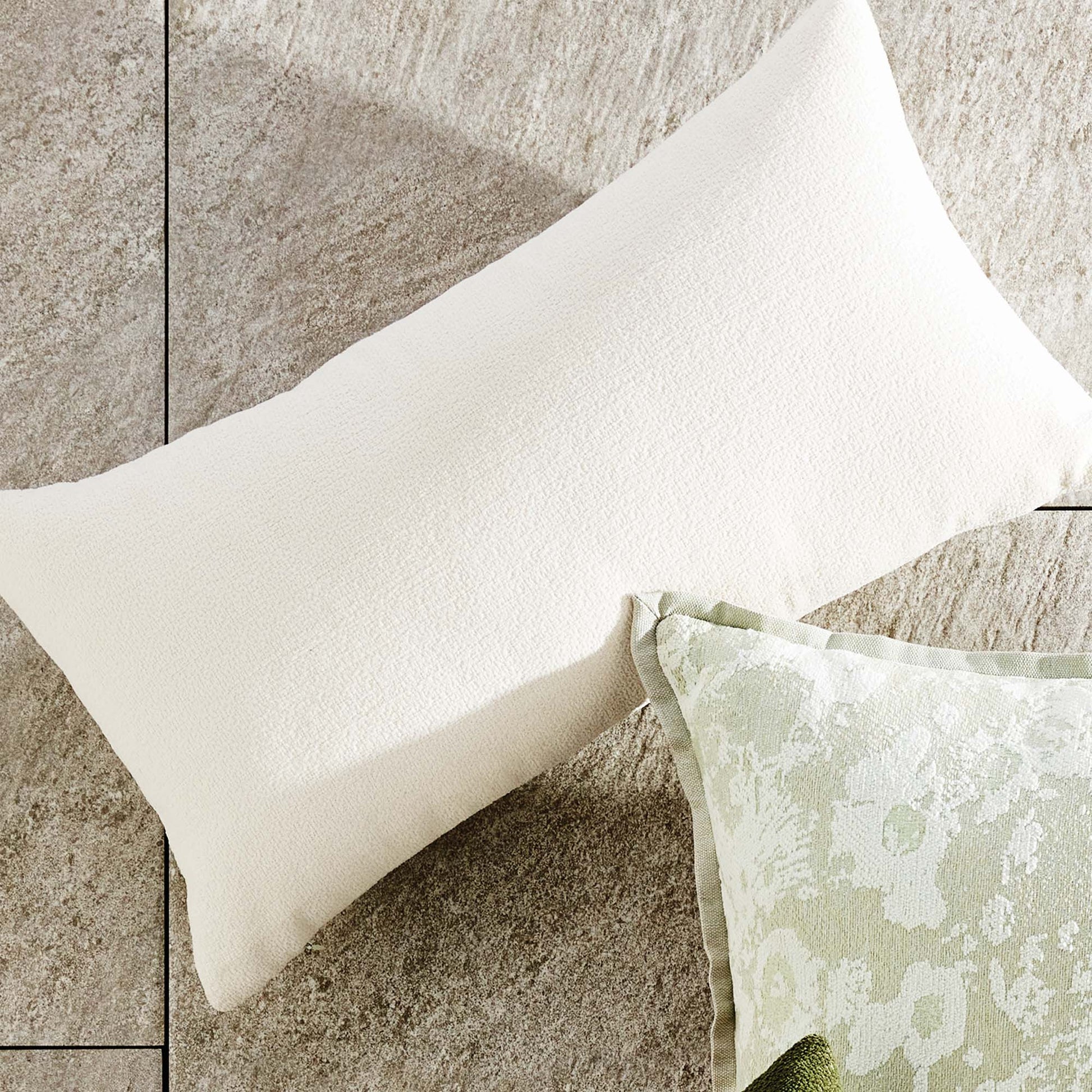 Light cream jacquard woven pillow for home decor and accessories.