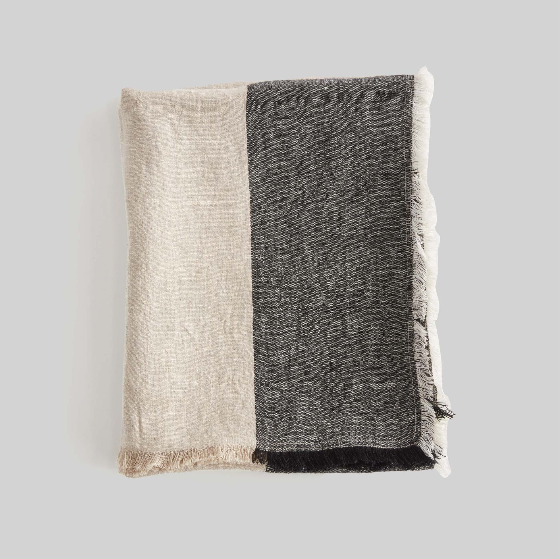 Lightweight charcoal & ivory linen woven throw for home decor and accessories.