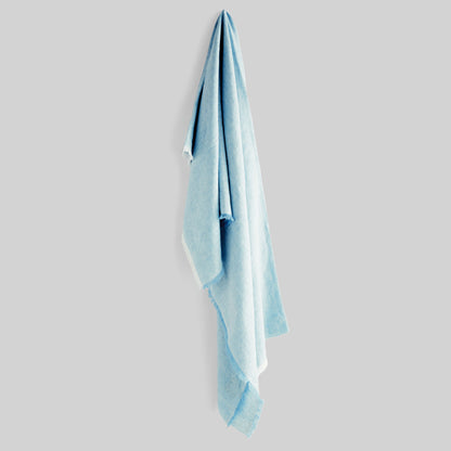 Lightweight light blue linen woven throw for home decor and accessories.