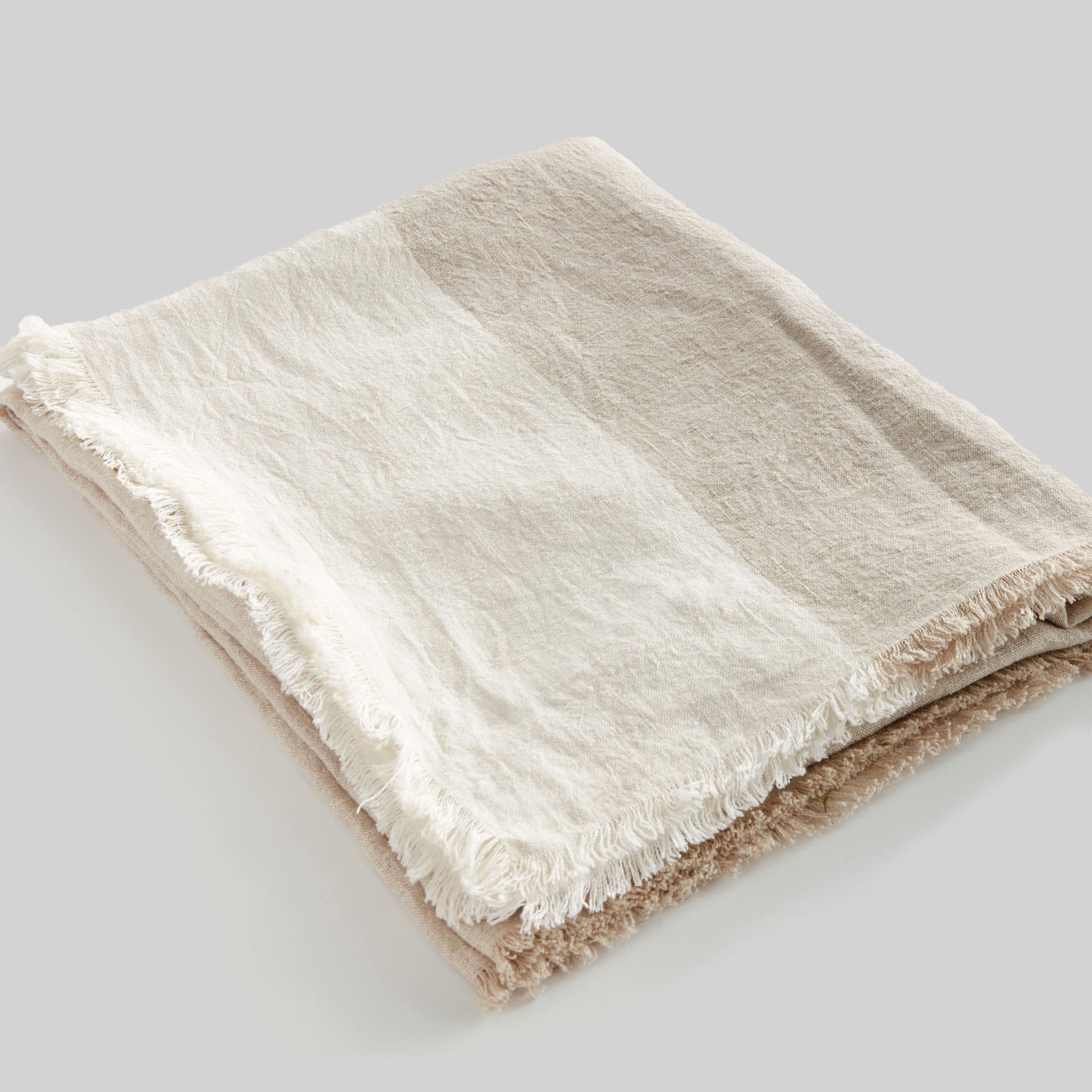 Lightweight tan & ivory linen woven throw for home decor and accessories.