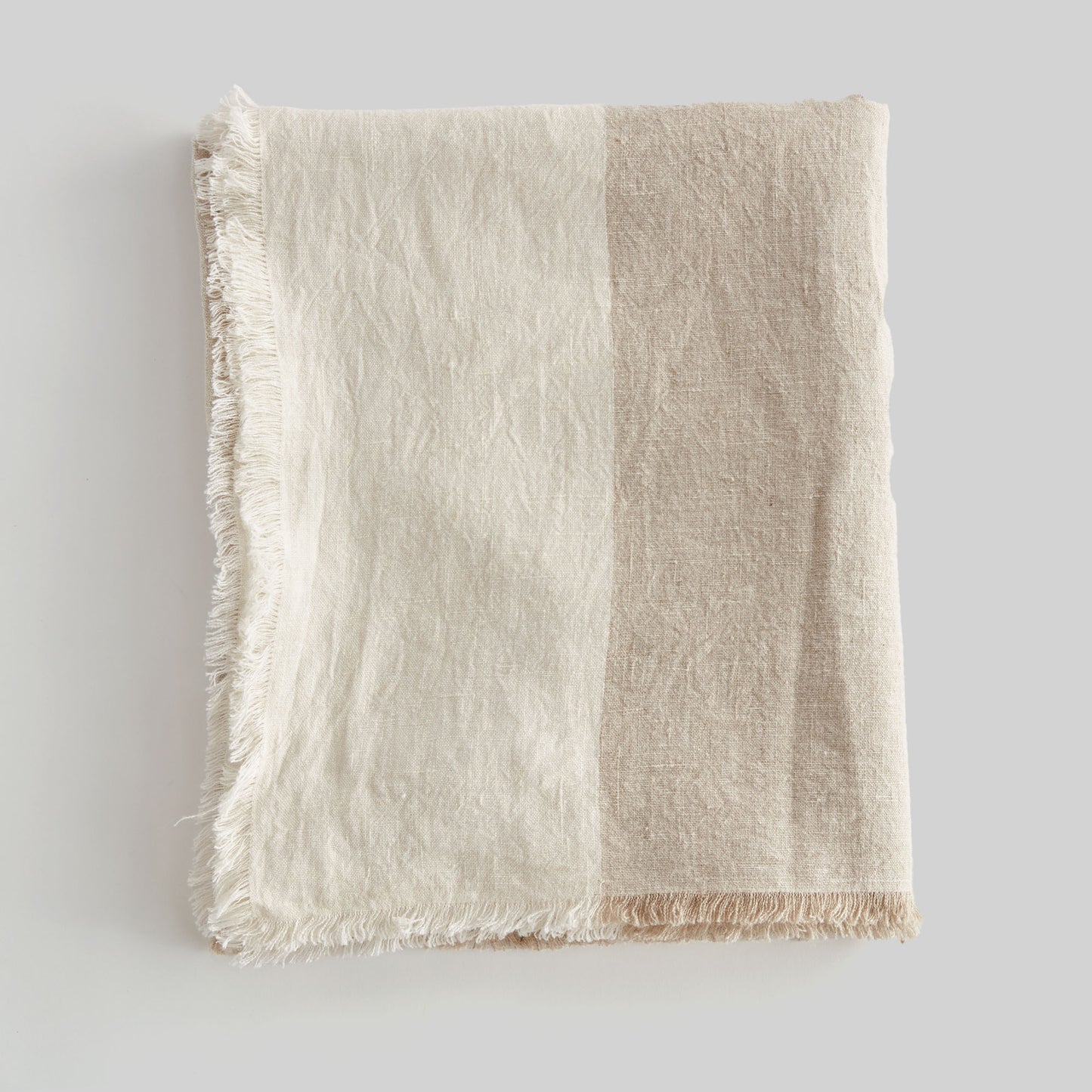 Lightweight tan & ivory linen woven throw for home decor and accessories.