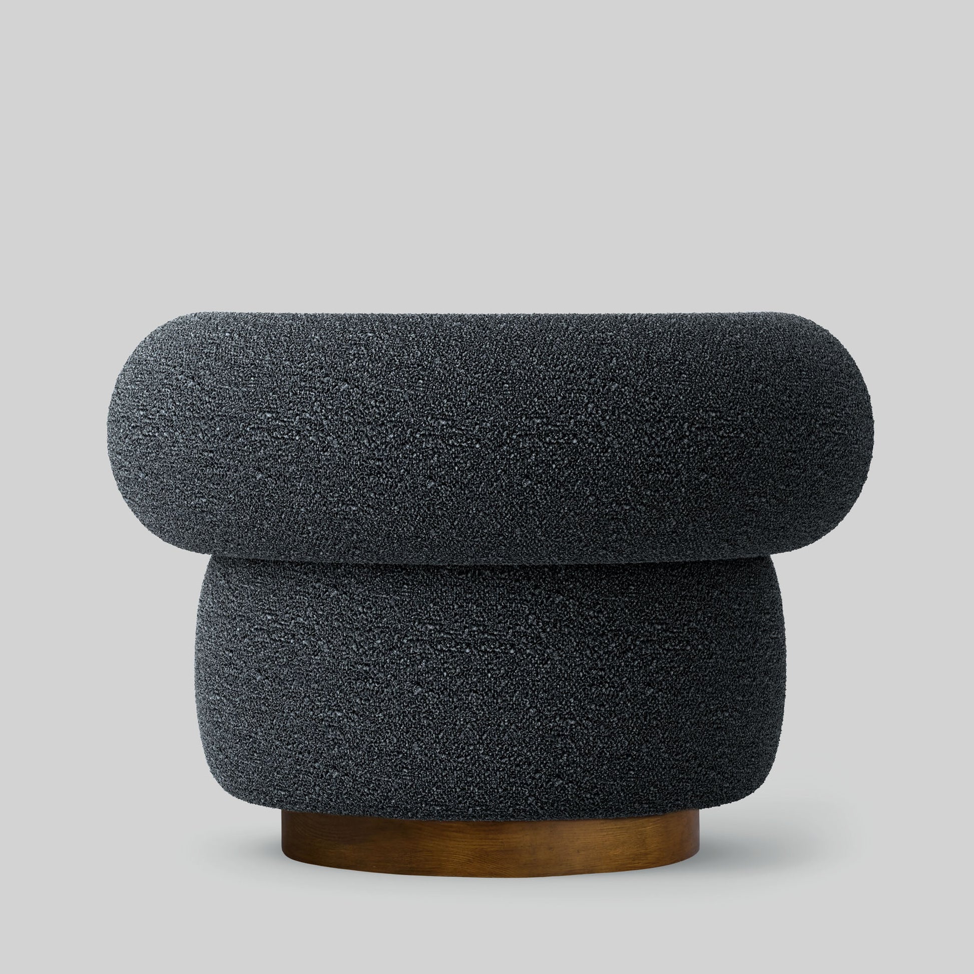 Gray textured fabric armchair on a light gray background.