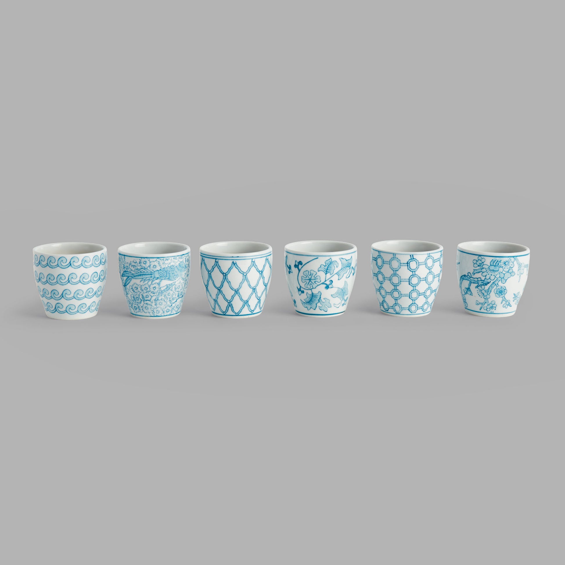 Mini light blue hand-painted porcelain flower pots (set of 6) - stylish home accent (Image1).