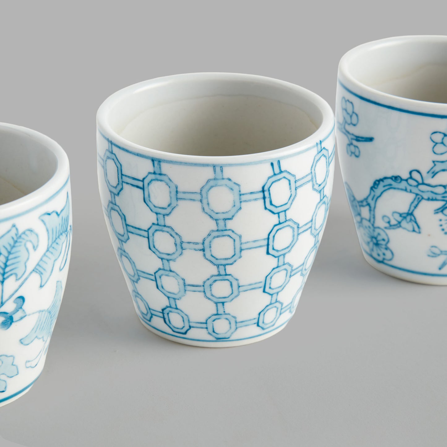Mini light blue hand-painted porcelain flower pots (set of 6) - stylish home accent (Image7).