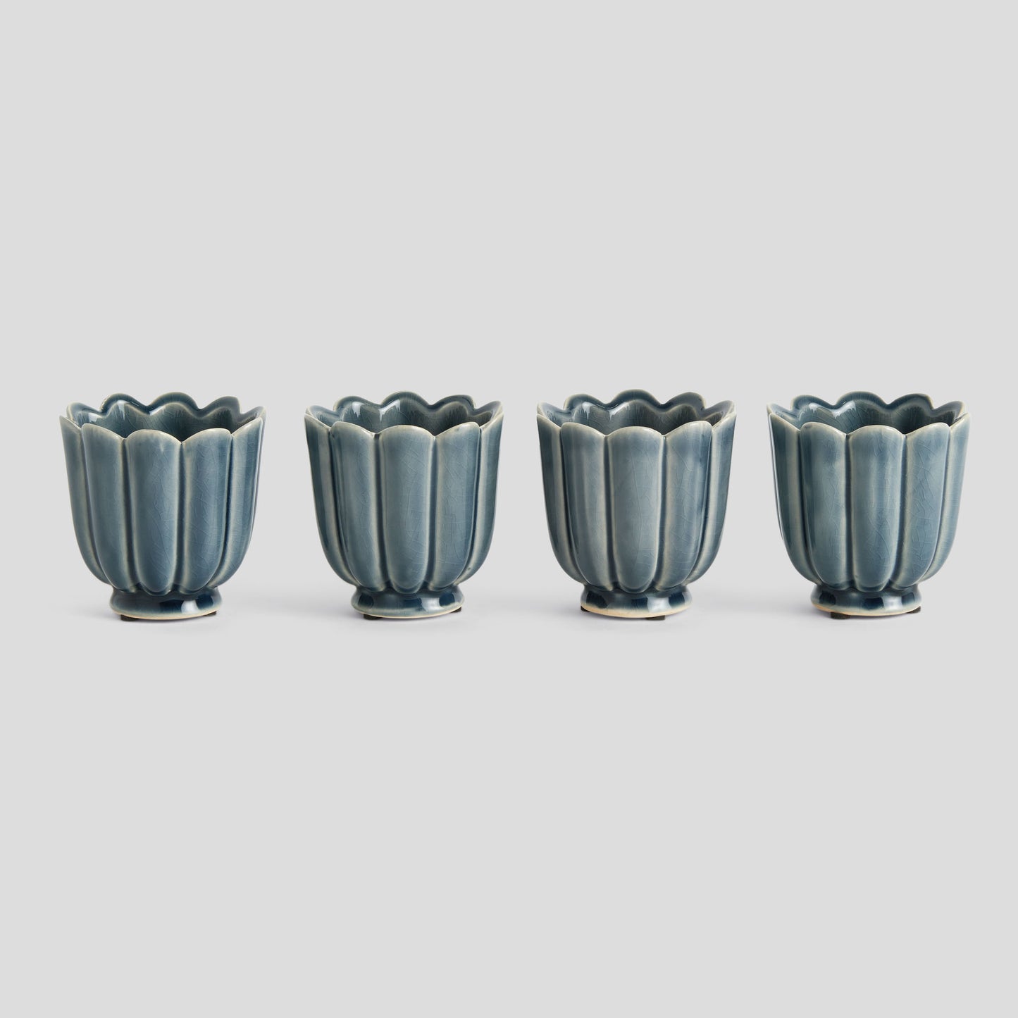 Mini teal reactive glaze ceramic pots (set of 4) - stylish home accent (Image1).