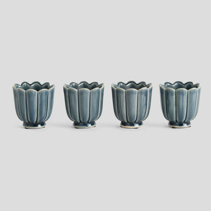 Mini teal reactive glaze ceramic pots (set of 4) - stylish home accent (Image1).