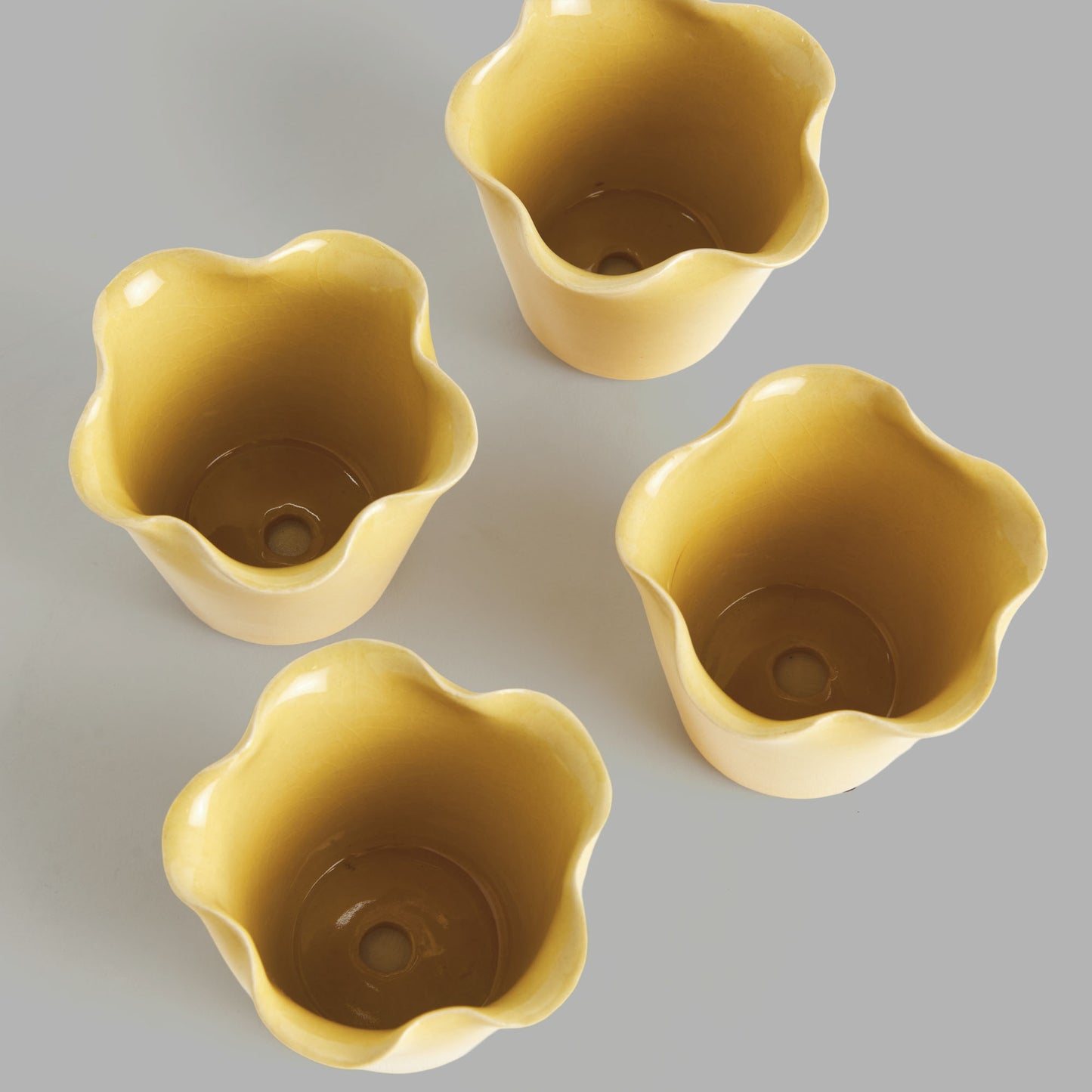 Mini yellow reactive glaze ceramic pots (set of 4) - stylish home accent (Image2).