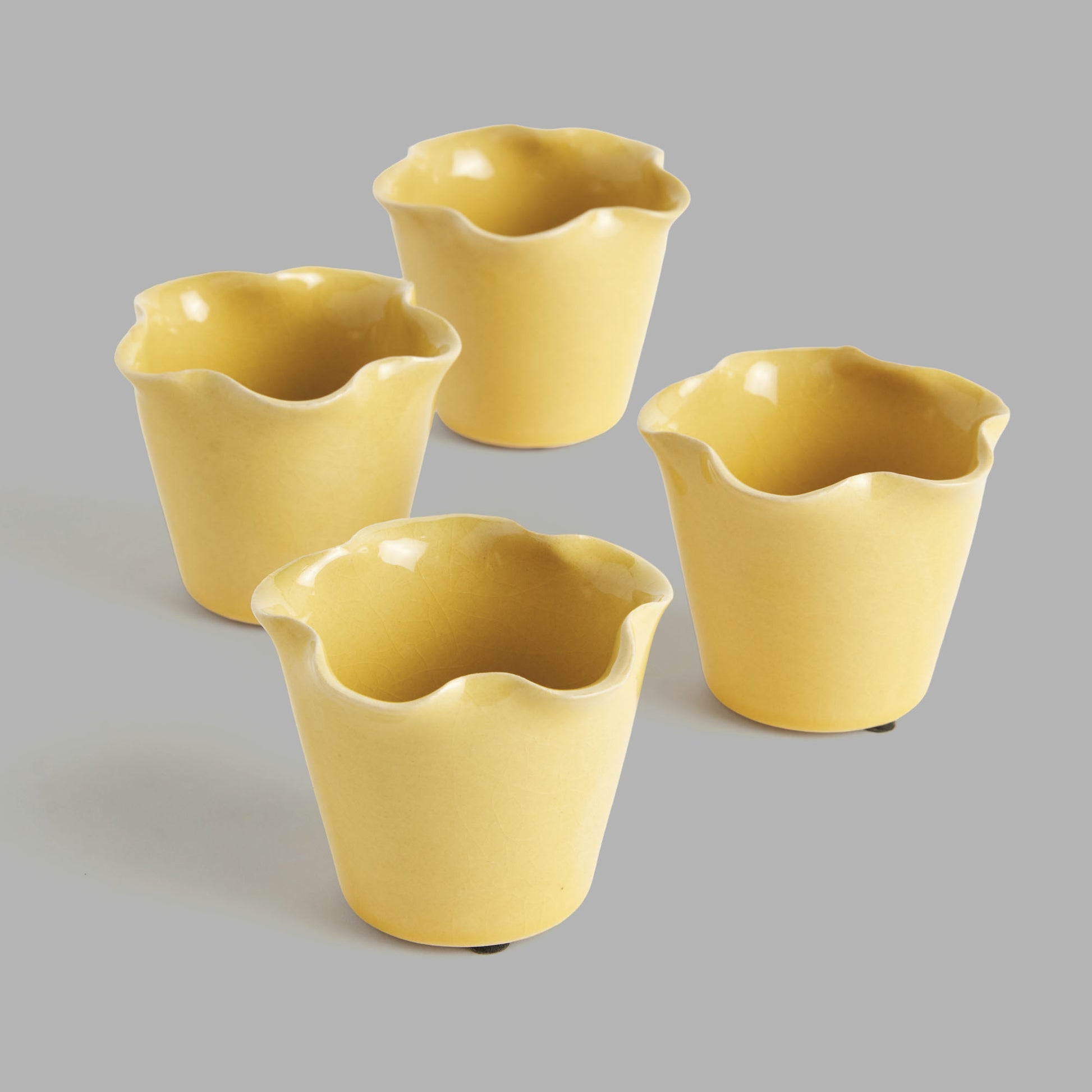 Mini yellow reactive glaze ceramic pots (set of 4) - stylish home accent (Image3).