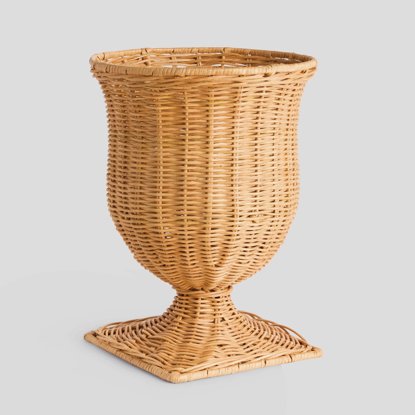 Narrow woven rattan vase - stylish home accent (Image1).
